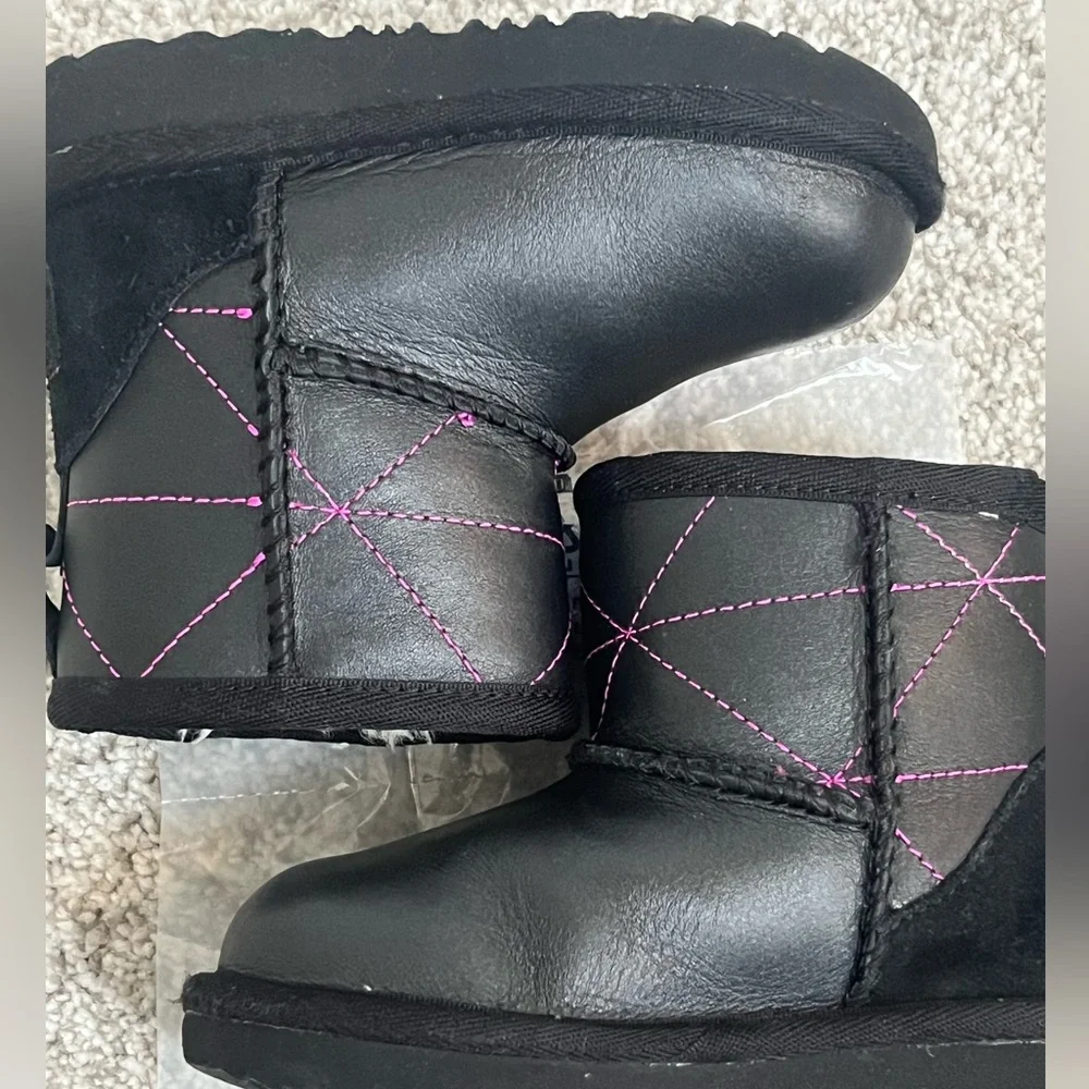 UGG Classic Mini Black Leather Boots with Pink Accents